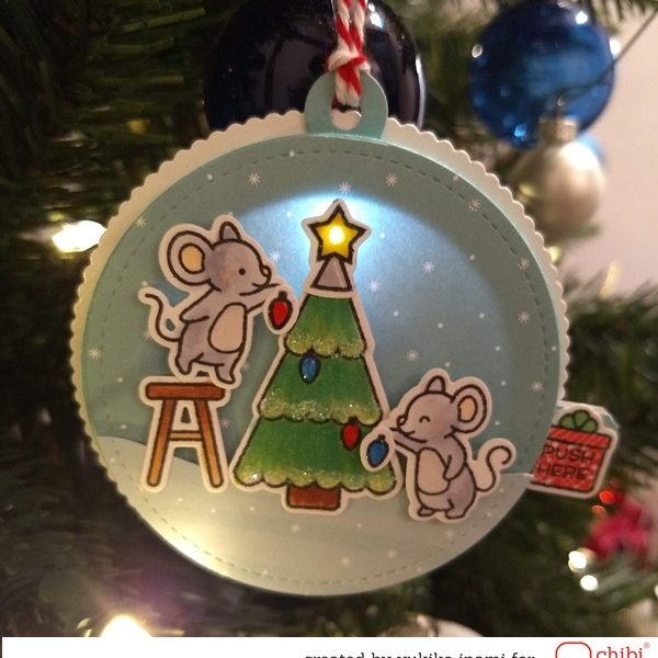 The Light Up Music Box Tag