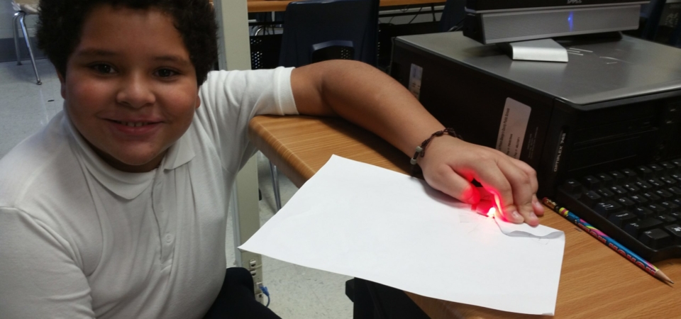 4th grader builds simple circuit LED light