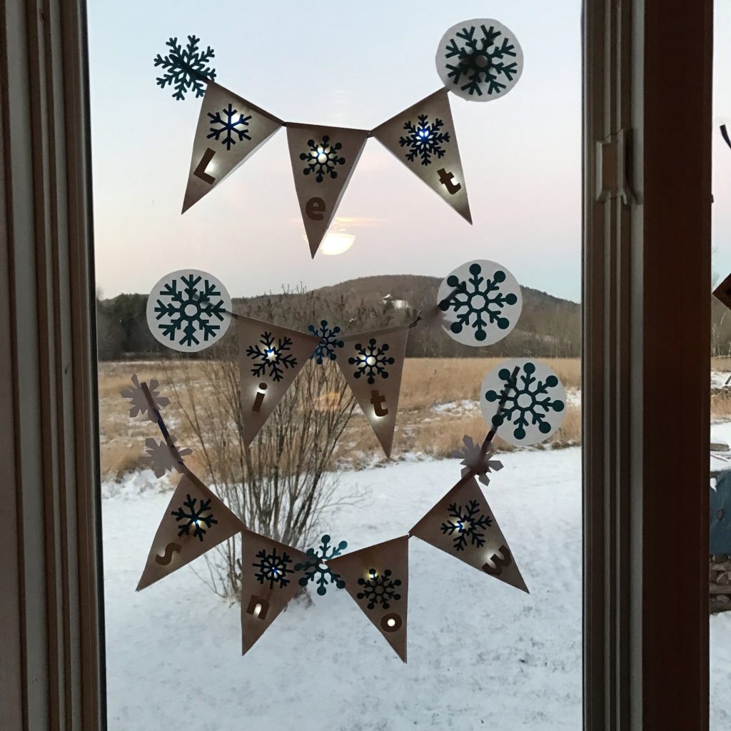 Glowing garland light up paper circuit