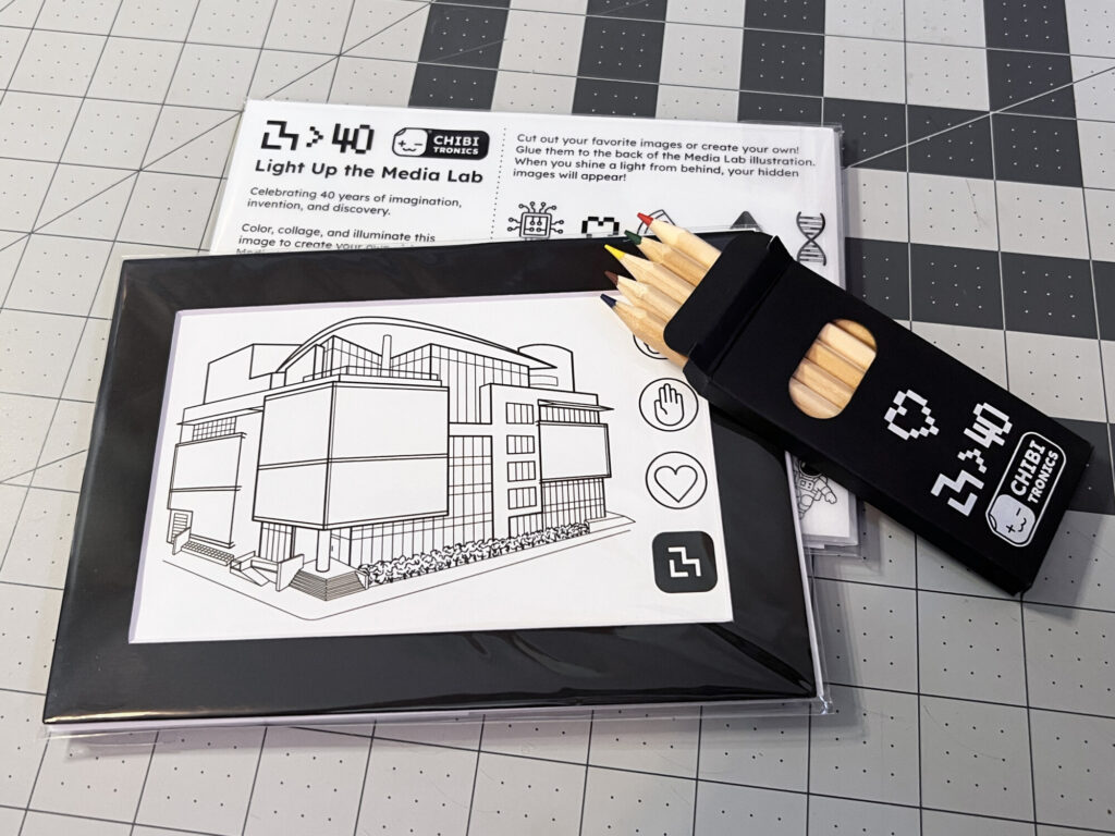 Media Lab drawing, translucent artwork, colored pencils, frame, backing board, and picture stand