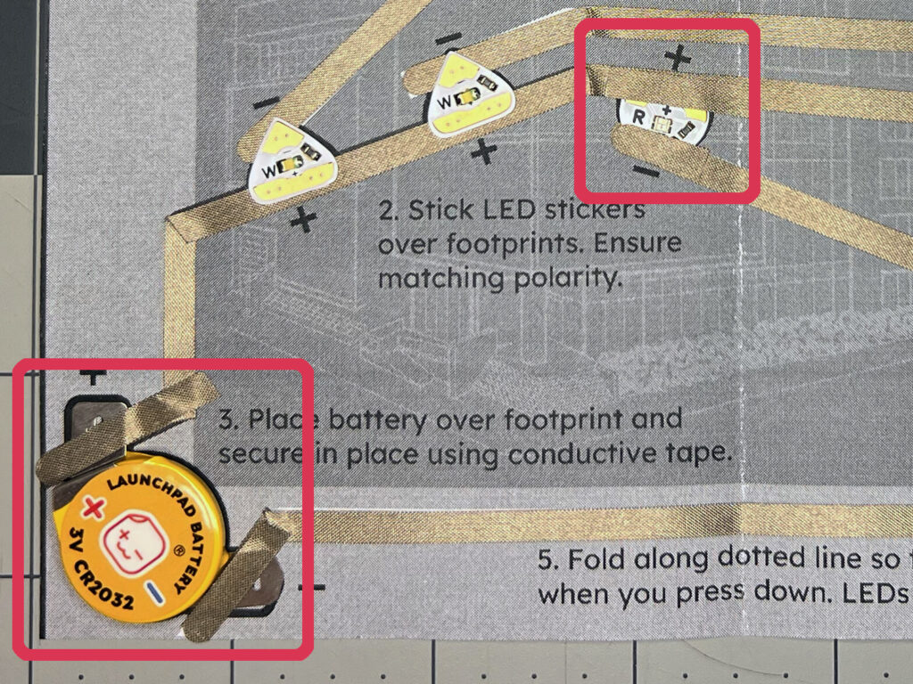 Conductive tape reinforcing the LED and Launchpad battery contacts